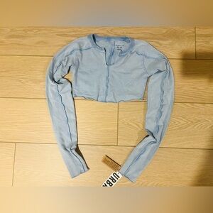 Urban Outfitters long sleeved light blue acid washed crop top size xs NWT